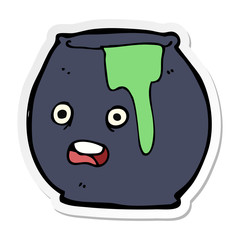 sticker of a cartoon cauldron