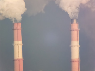 Pipes smoke, carry out harmful emissions. Global warming. Carbon dioxide emissions