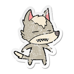 distressed sticker of a cartoon wolf showing teeth