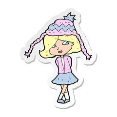 sticker of a cartoon happy girl wearing hat