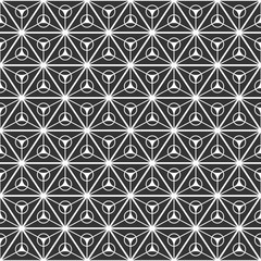Abstract seamless pattern of triangles divided into three equal parts with a circles inside.