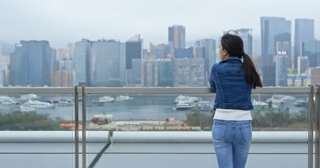 Woman look the city view