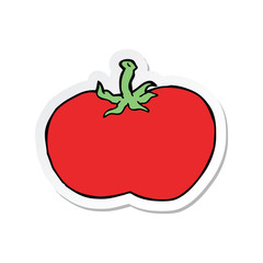 sticker of a cartoon tomato