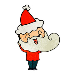 happy bearded man wearing santa hat