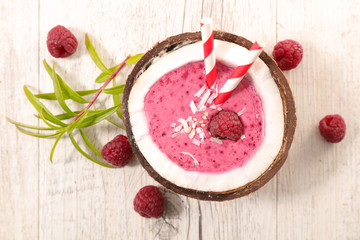 berry smoothie in coconut bowl