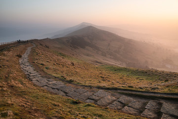Stunning Winter sunrise landscape image of The Great Ridge in the Peak Distrit in England with a...