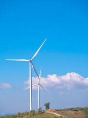 Wind turbines are spinning to generate electricity.