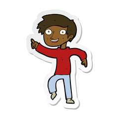 sticker of a cartoon happy boy pointing