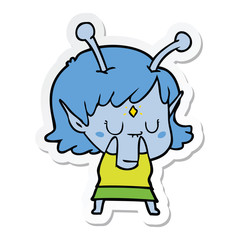 sticker of a cartoon alien girl