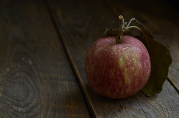Apple closeup wooden background