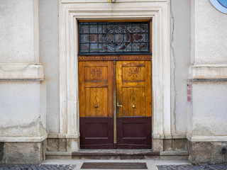 Oak wood entrance on local catholic church.