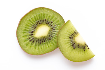 Fototapeta premium Kiwi fruit slices on white background.