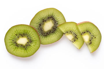 Kiwi fruit slices on white background.