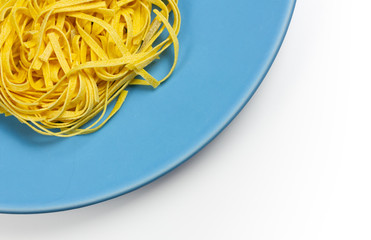 Italian Egg Pasta on a Blue Dish