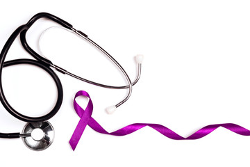 Purple epilepsy awareness ribbon with stethoscope and copy space on a white background. World epilepsy day.