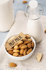 Homemade almond milk and raw ingredients. Diet food.