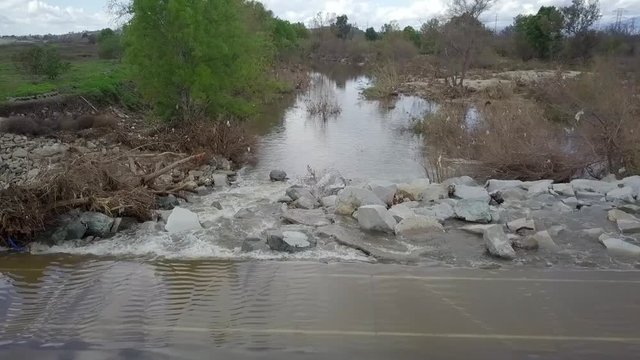 Flood Water Flowing Over A Bike Path In Whittier Narrows Recreation Area.