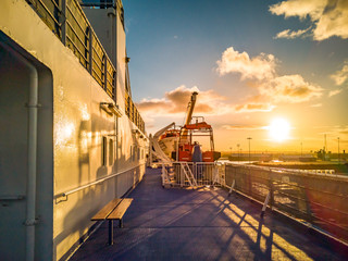 Sunset on deck of a huge cruise ship vessel