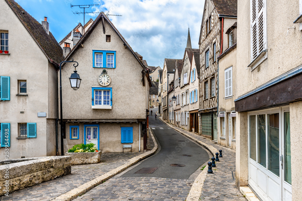 Poster Cozy street with old houses in a small town Chartres, France