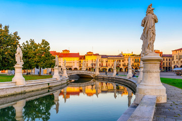 View of the canal with statues on Prato della Valle in Padova (Padua), Veneto, Italy