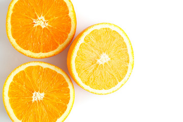 Fototapeta na wymiar slices of fresh orange on white background