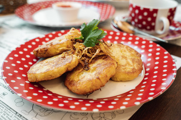 Russian food on red plate