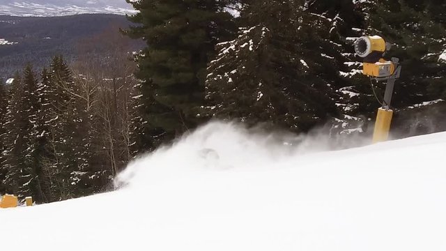 Snowboarding snow spraying