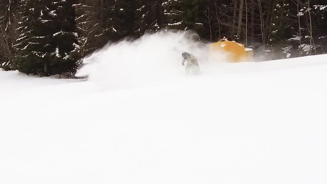 Snowboarding snow spraying