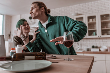 Husband feeling emotional having wife addicted at alcohol