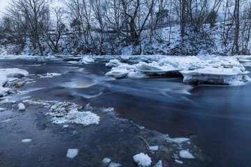 Beautiful frozen waterfall in winter. Jagala, Estonia, Eastern Europe.