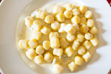 top view of gnocchi with sauce from Gorgonzola