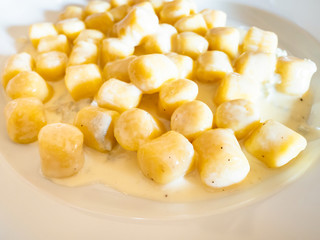gnocchi with sauce from Gorgonzola cheese close up