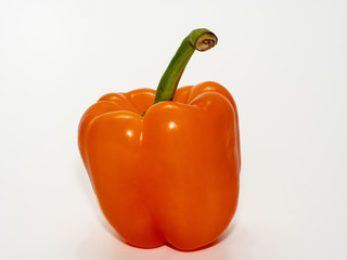 An orange peppers on a white background, released