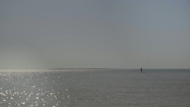 Sea view - Horizon, Silhouette paddling on paddle board