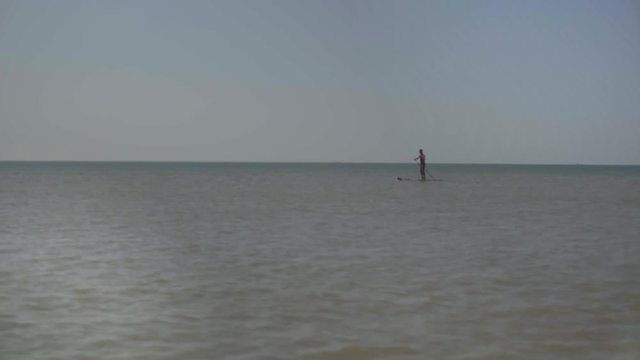 Sea view - Horizon, Silhouette paddling on paddle board