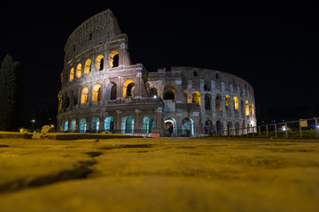 Fototapeta na wymiar The Colosseum, the world famous landmark in Rome. Night view
