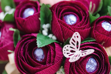 gift bouquets of paper flowers with chocolates inside