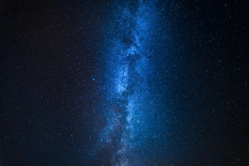 Milky way with million stars at night as blue background