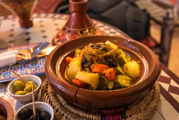 Tagine with beef and vegetables - traditional food of Morocco. Traditional moroccan cuisine. 