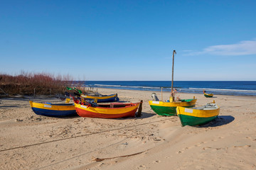 Fototapeta premium Fishing boats stand in the beach, Baltic Sea, Jantar resort, Poland