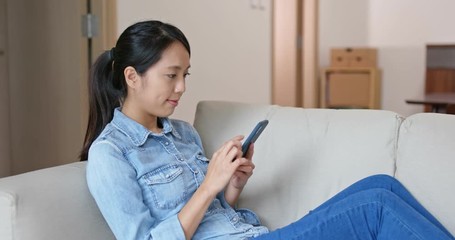 Woman use mobile phone online