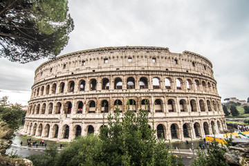 Fototapeta na wymiar ROME, ITALY- November, 2018: Colloseum in Rome most remarkable landmark of Rome and Italy. Colosseum - elliptical amphitheatre in the centre of the city of Rome.