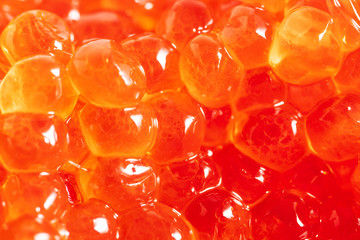 Red caviar as an abstract background