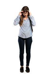 Full-length shot of Woman with glasses with headache