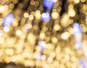 Golden bokeh lights as abstract background