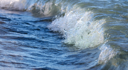 Waves on the seashore as an abstract background
