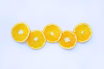 Fresh orange citrus fruit slices isolated on white.