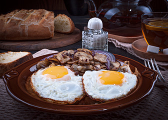 Fried mushrooms with scrambled eggs.