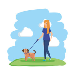Obraz na płótnie Canvas young woman walking with dog