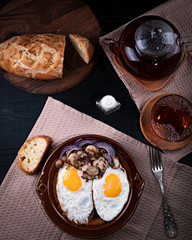 Fried mushrooms with scrambled eggs.